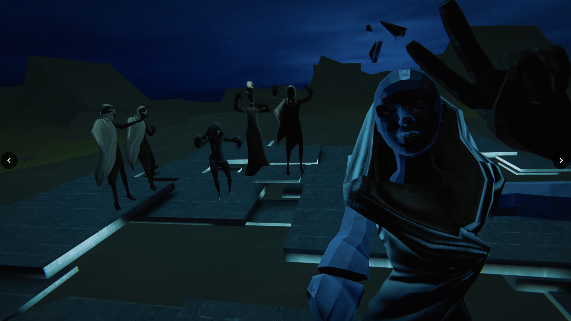 A group of people a stranding on slabs in a desert-like place. There is someone close to you, facing you and holding onto you. Their hand is stretched above you. All the people are blue and bald.