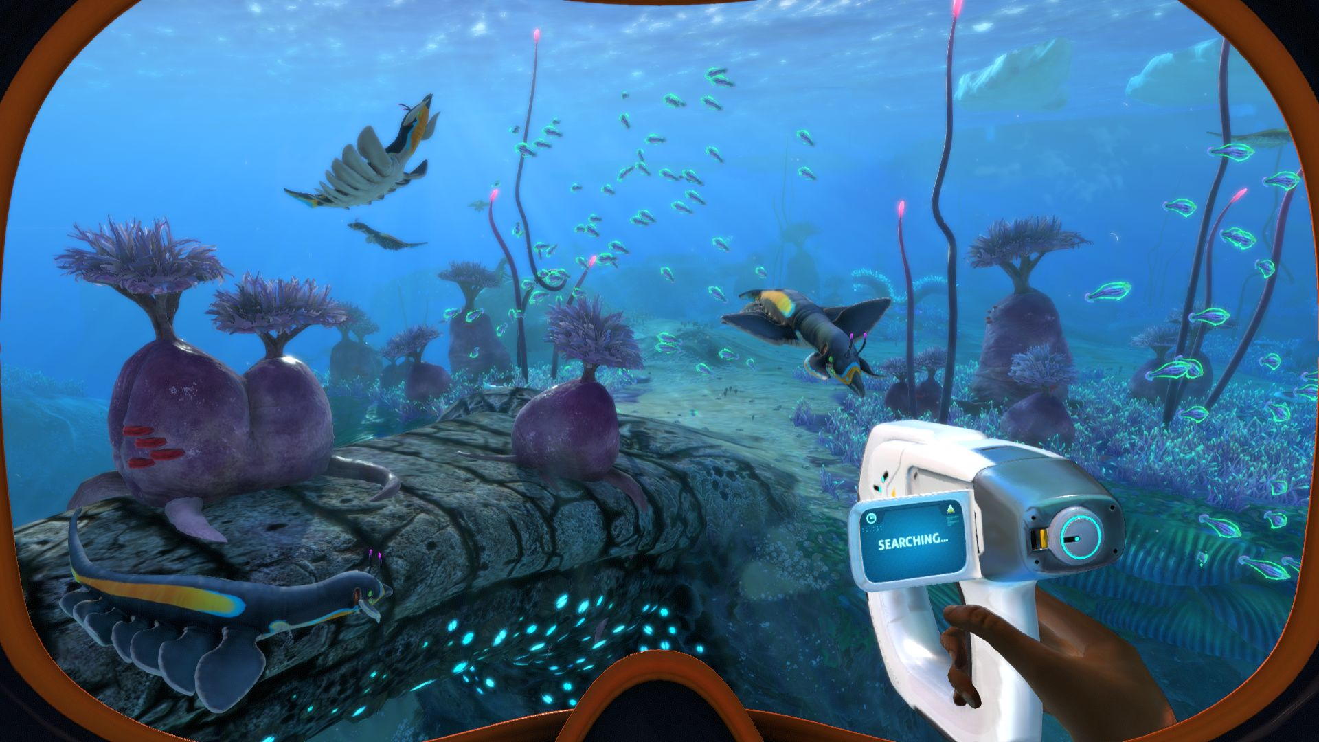 Image of a virtual underwater scene with a hand holding a recording camera in the bottom right corner