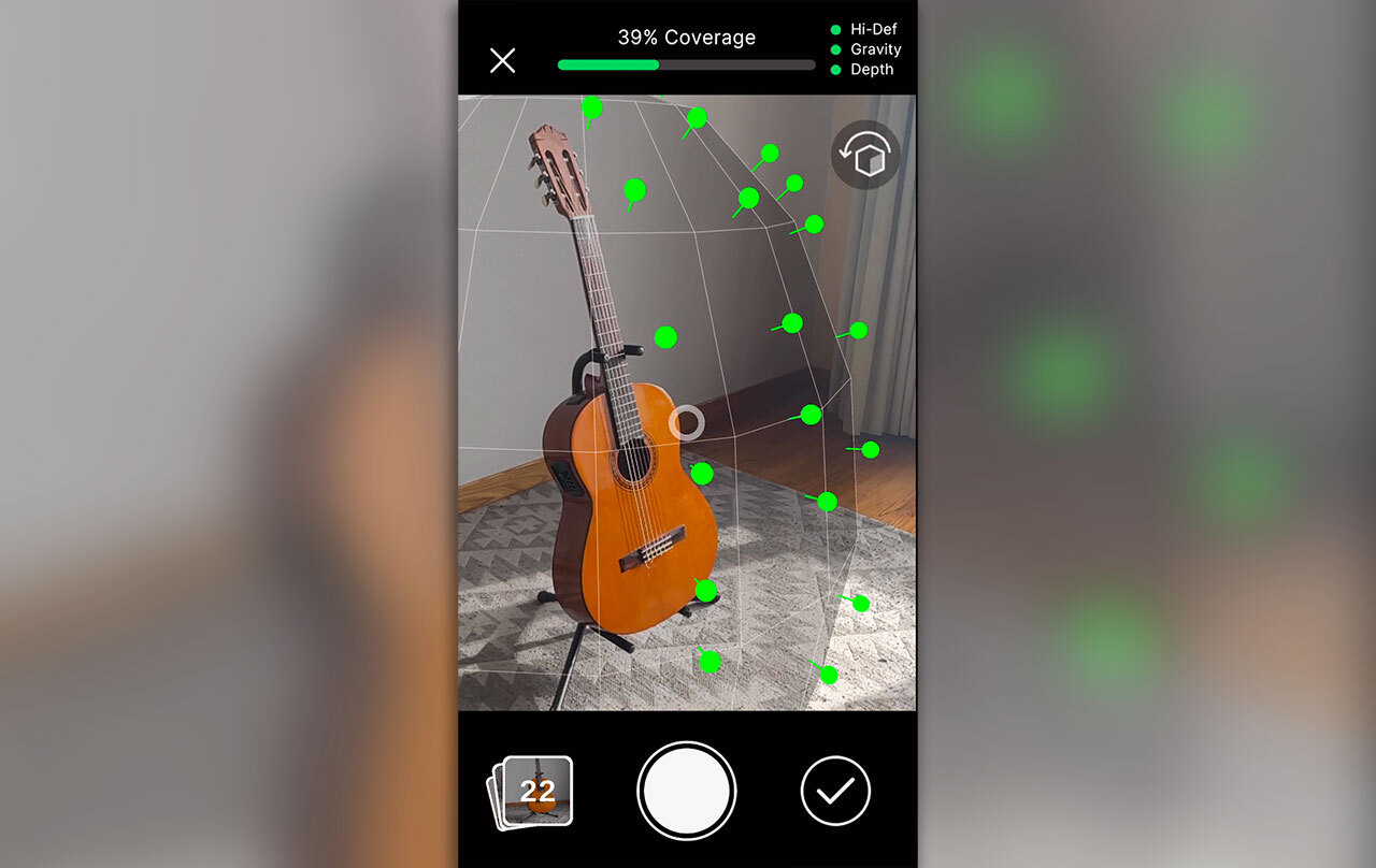 Phone screen grabbing an image of a guitar