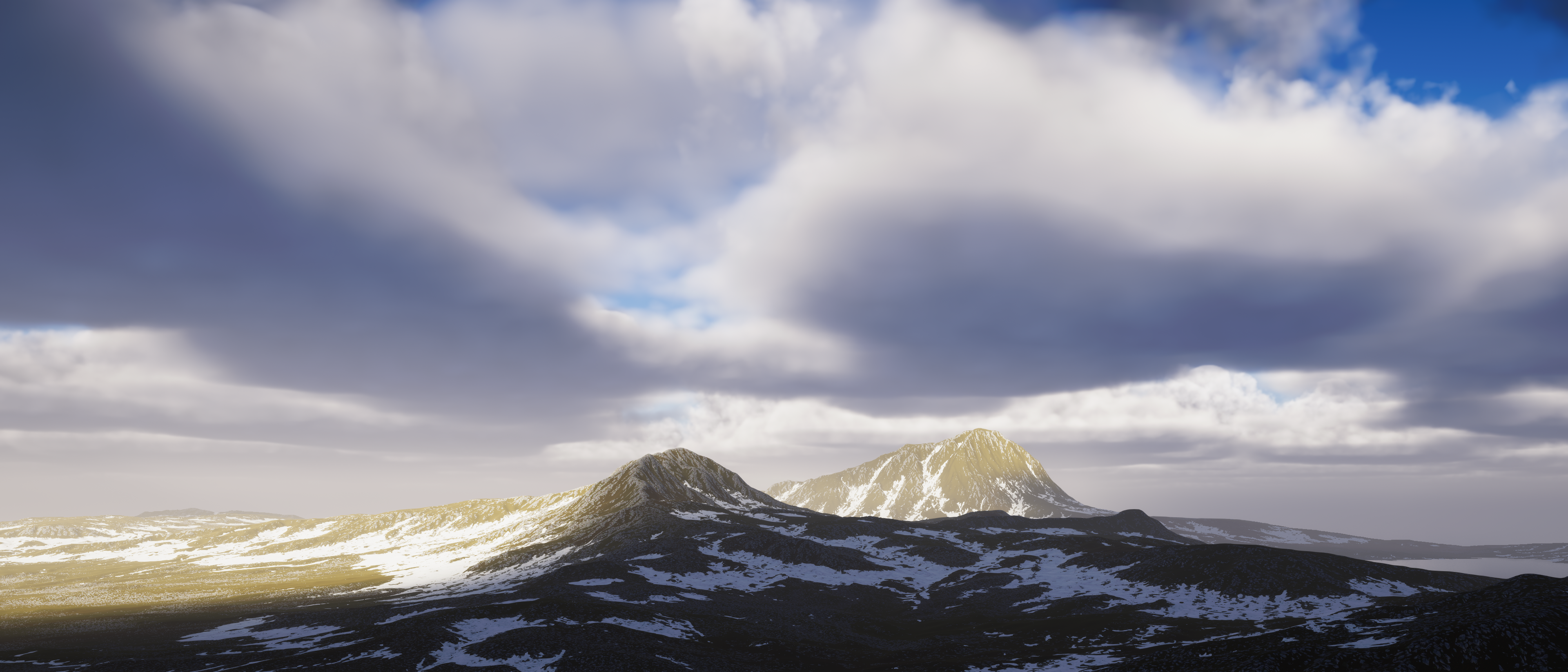 image of cloudy overcast above snowy mountain range