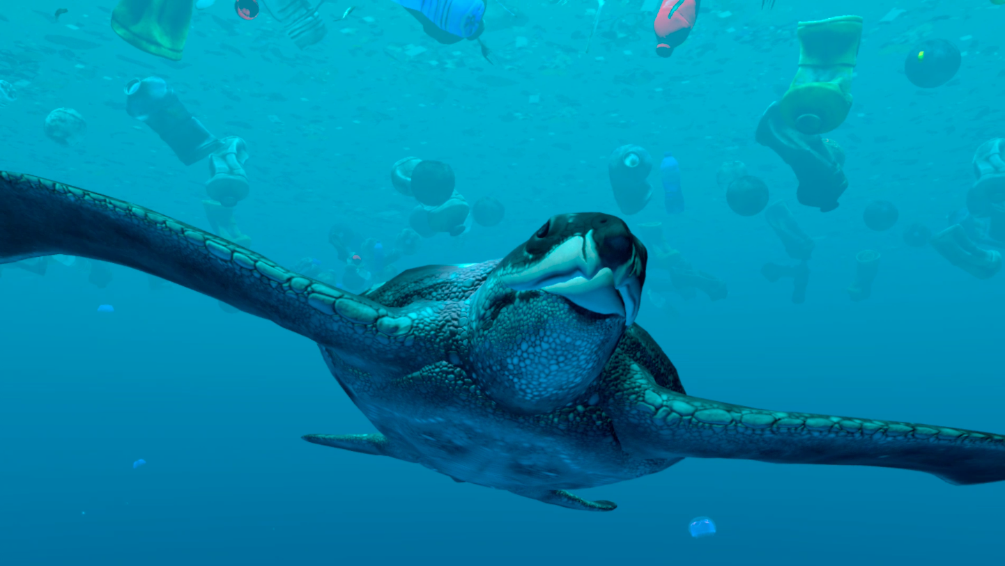 A leatherback turtle swimming towards the viewer underneath the surface of the ocean, which is littered with plastic bottles, as featured in the VR experience Drop in the Ocean