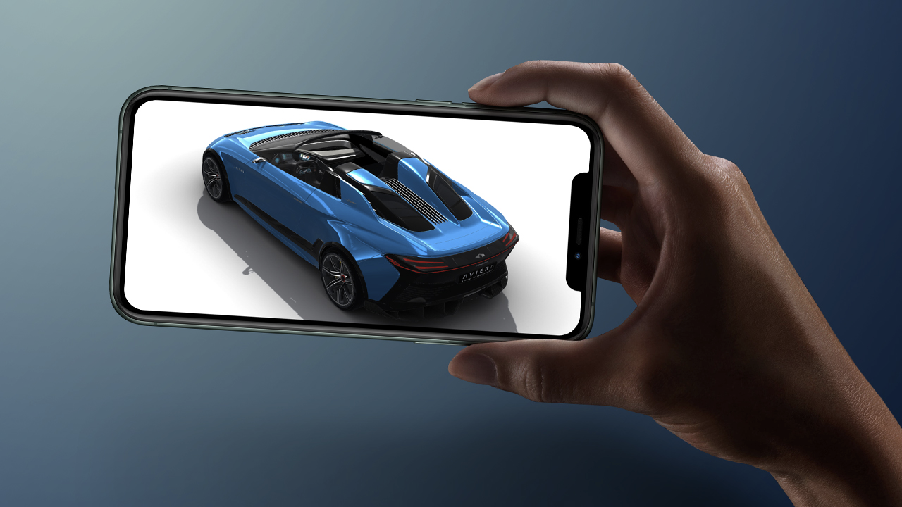 Hand holding smartphone showing a blue car