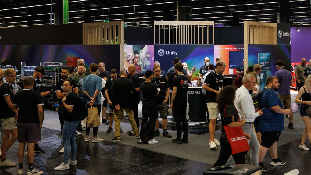Image of attendees in the Unity booth at gamescom 2022