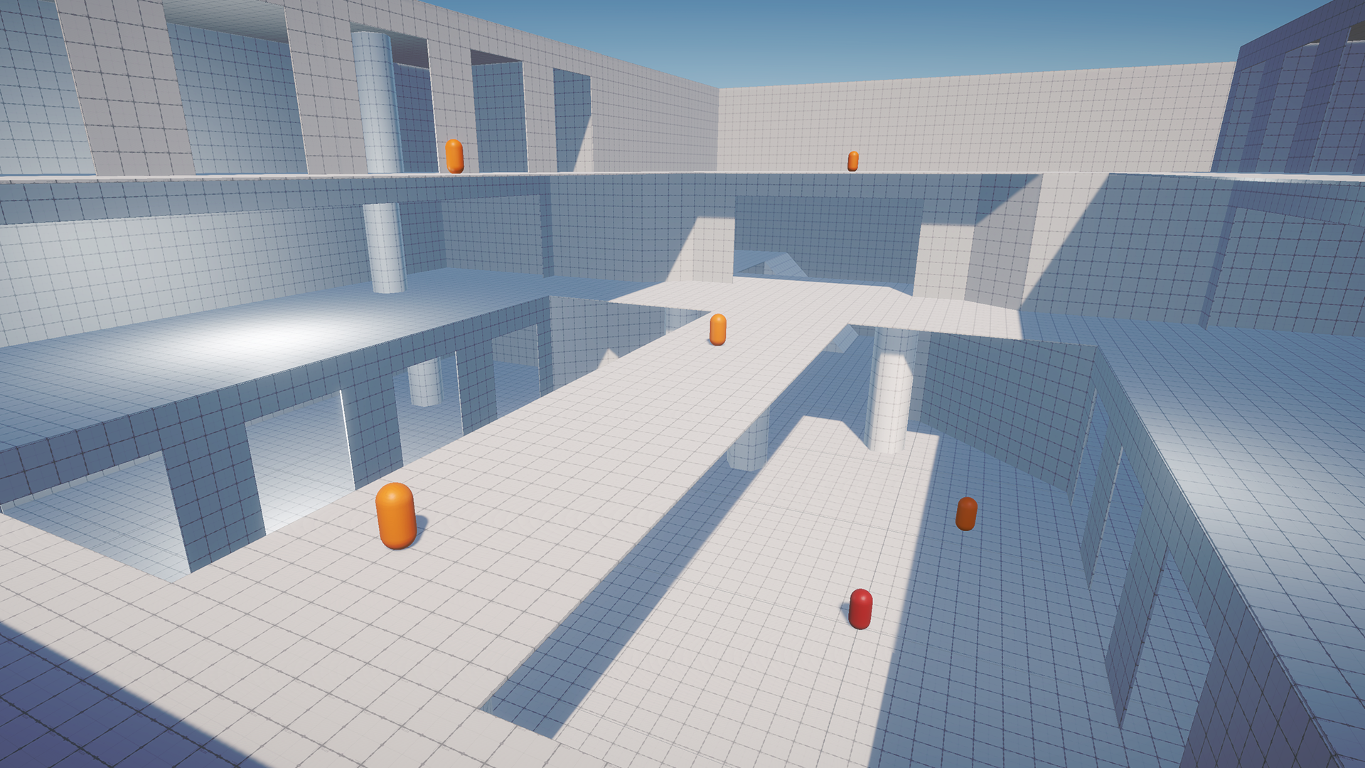 Sample game environment showing a tiled space with multiple levels, or floors, and pill-shaped objects placed at different tiers