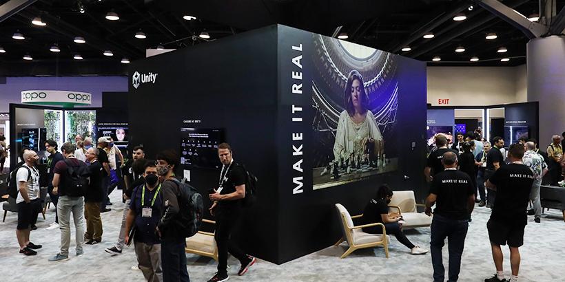 Wide photo of Unity's SIGGRAPH 2022 booth at the Vancouver Convention Centre.