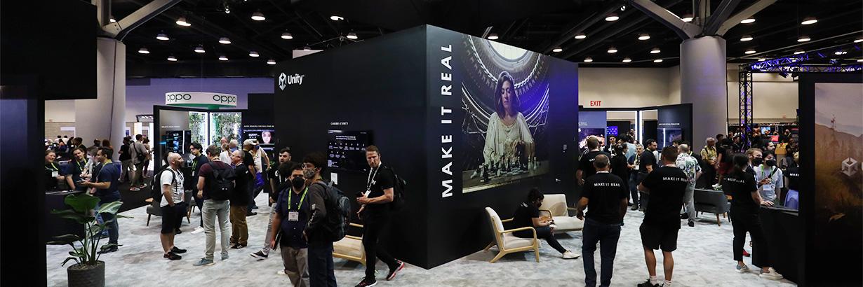 Wide photo of Unity's SIGGRAPH 2022 booth at the Vancouver Convention Centre.